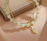 Pulseira dourada em pedras